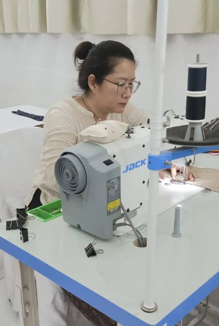 Keeps Loudder team member sewing