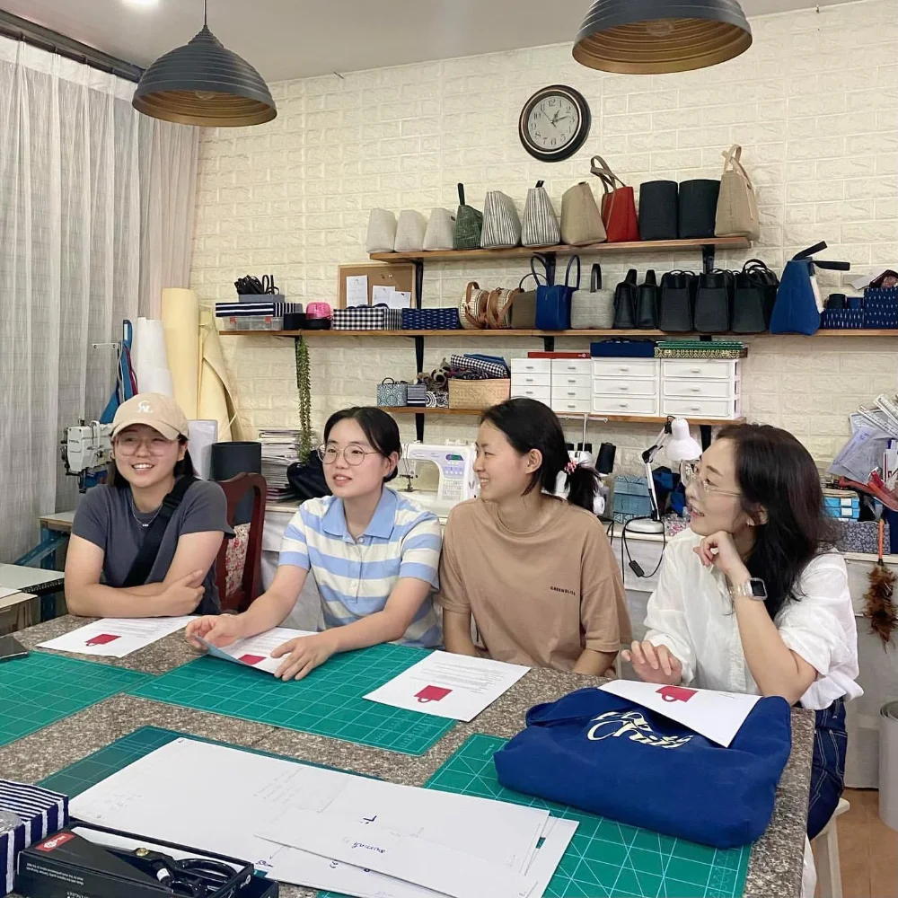 Keep Loudder holding a bag sewing workshop